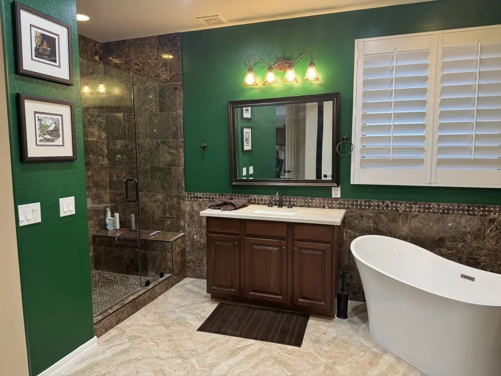 interior of a bathroom painted green
