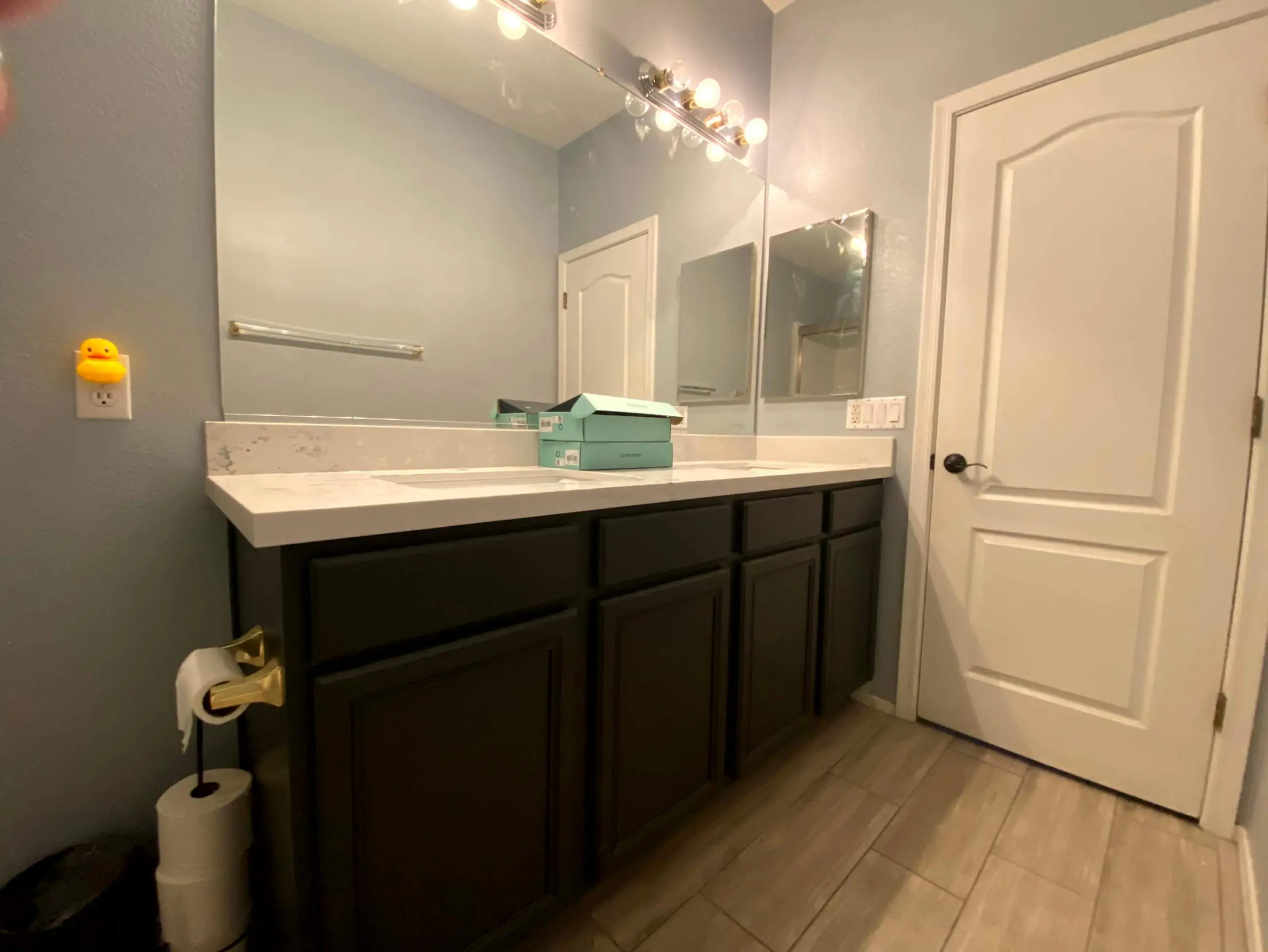 Bathroom vanity cabinets professionally painted by Butcher’s Custom Painting in Peoria, AZ