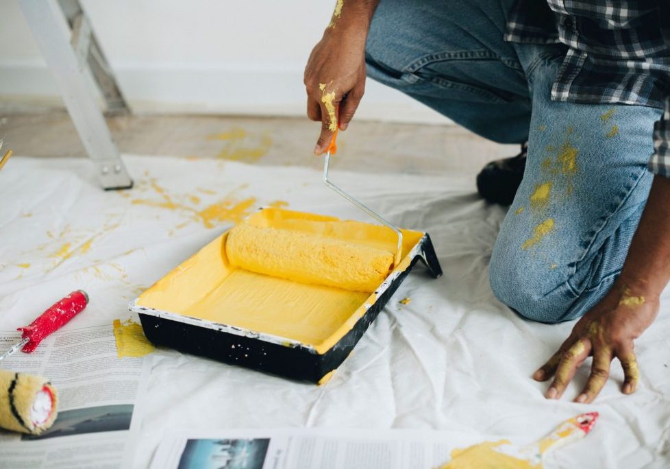 guy using a tellow paint